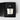 A Petra Living 11 oz classic bougie candle in a clear glass jar with white wax, displayed inside an open black gift box with matches and black foam insert. The candle label reads 'PETRA LIVING' and 'ADORE MON AMOUR'.