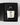 A Petra Living 11 oz classic bougie candle in a clear glass jar with white wax, displayed inside an open black gift box with matches and black foam insert. The candle label reads 'PETRA LIVING' and 'ADORE MON AMOUR'.