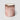 ADORE mon amour, a ribbed glass mercury candle with a metallic rose gold finish and speckled reflective detailing, shown on a light gray background.