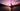Sailboat on a lake at sunset with purple and pink sky adore
