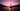 Sailboat on a lake at sunset with a purple sky