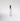 Pink bottle of perfume on white background.
