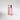 Pink perfume bottle and packaging with 'Petra Living' branding on a light gray background