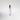 Pink perfume bottle with a metallic cap on a light gray background