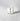 Petra Living candle with 'Adore' branding on a gray background petite bougie votive