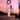 Petra Living perfume bottle with a sailboat and sunset in the background