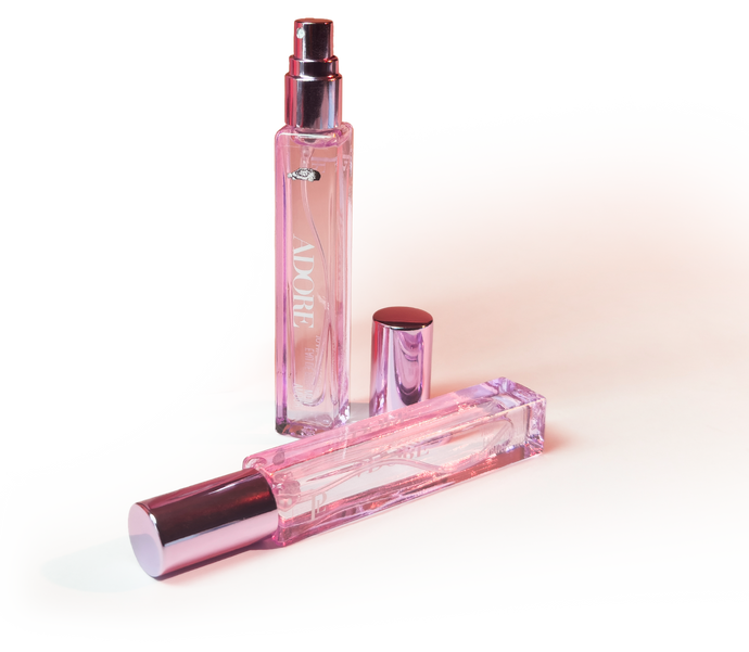 Pink 'Adore' perfume bottle with cap on a gradient background