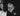 Black and white close-up of a couple smiling the art of date night