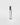 The back of a clear glass leather noir travel spray perfume bottle with a metallic silver cap, standing upright on a light gray background.