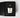 A Petra Living 'Leather Noir' petite votive scented candle in a clear glass jar, nestled inside its textured black presentation box with a matching black label.