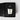 A Petra Living 'Leather Noir' petite votive scented candle in a clear glass jar, nestled inside its textured black presentation box with a matching black label.