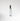 Clear glass 'Leather Noir' perfume bottle with silver cap on a white background