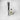Clear fluted glass diffuser base with black reeds and 6oz parasol fragrance refill bottle