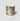 A cylindrical RICKHOUSE boubon scented candle in a metallic silver jar with a marbled, abstract pattern of dark gray and brown veins, set against a plain light gray background.