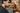 Man and woman facing each other with a neutral background