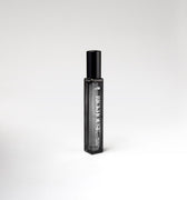 Black perfume bottle with 'Rickhouse' branding on a white background