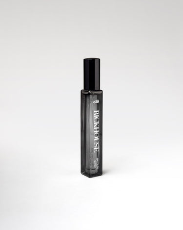 Black perfume bottle with 'Rickhouse' branding on a white background