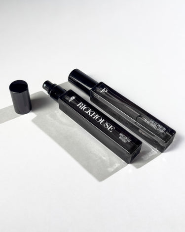 Two black bottles with 'RICKHOUSE' branding on a white background