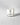 Clear candle in a glass container with a label on a gray background petite bougie votive