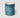 TRACKSIDE soleil del mar, a mercury ribbed glass candle in blue hues with a textured blue and white pattern, presented on a light gray background.