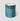 TRACKSIDE soleil del mar, a mercury ribbed glass candle in blue hues with a textured blue and white pattern, presented on a light gray background.