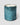 TRACKSIDE soleil del mar, a mercury ribbed glass candle in blue hues with a textured blue and white pattern, presented on a light gray background.