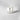 Clear candle in a glass container with a label on a light gray background petite bougie votive