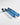 Blue spray bottle with 'Trackside' branding on a white background