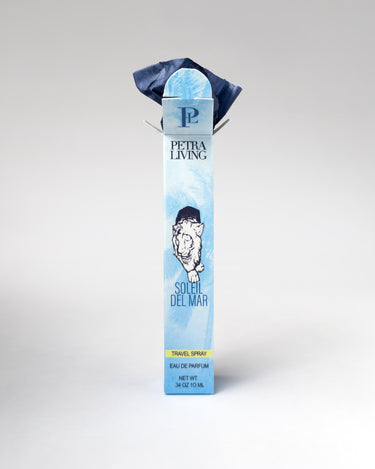 Petra Living Soleil Del Mar travel spray bottle on a light gray background