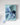 blue gift box en bleu with a bow on a light gray background